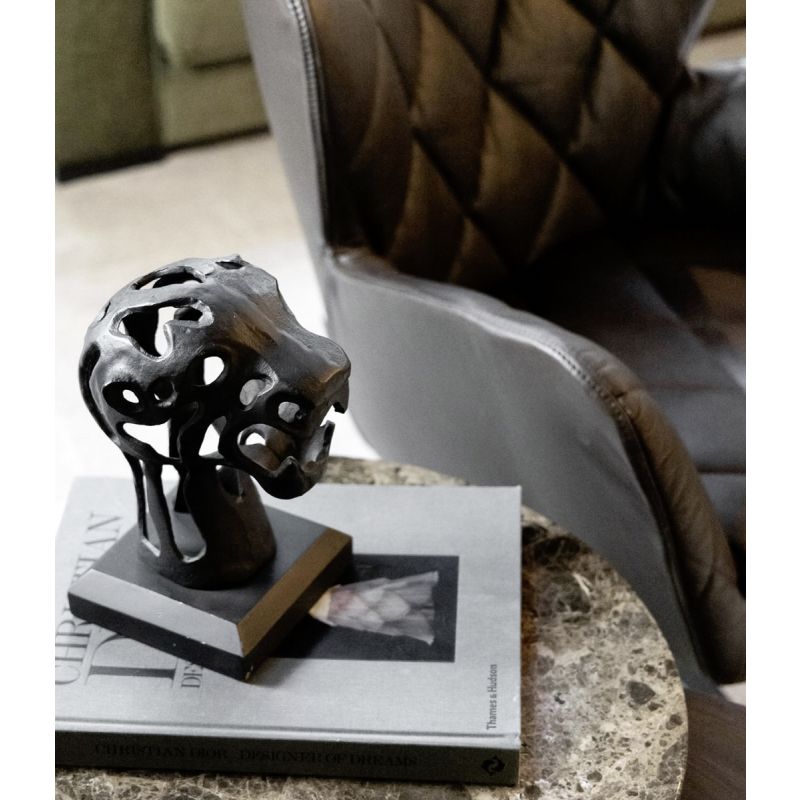 Artistically crafted sculpture of a panther head, with a black metal square base