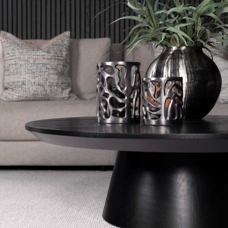 Low round black coffee table with cylindrical base