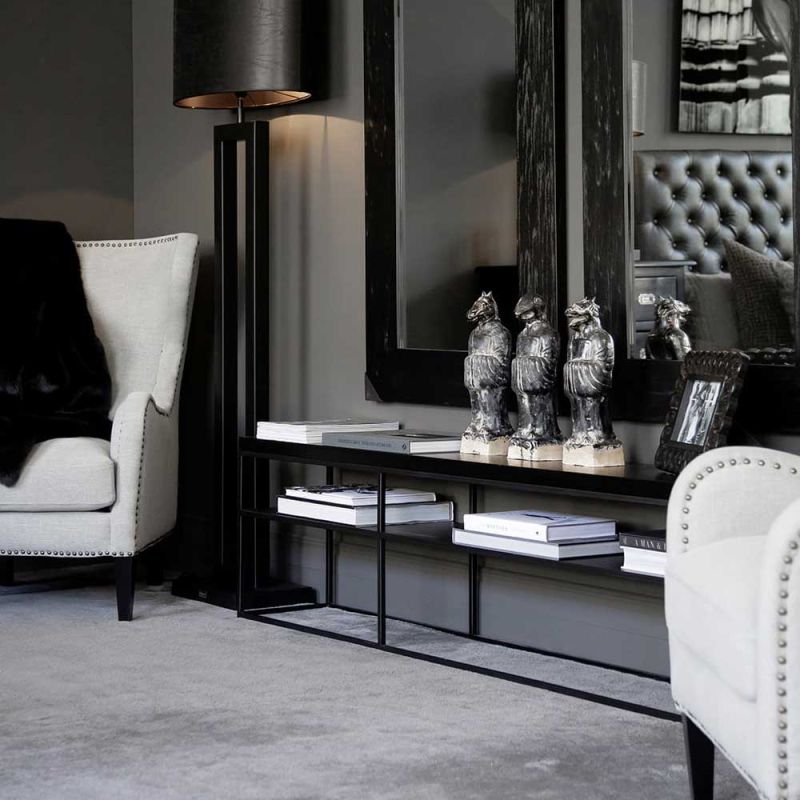Open media unit with black metal frame and two black wooden top shelves
