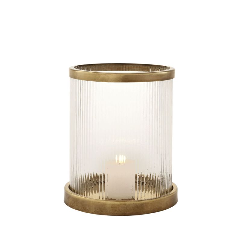 An elegant ribbed candle holder with an antique brass base and rim