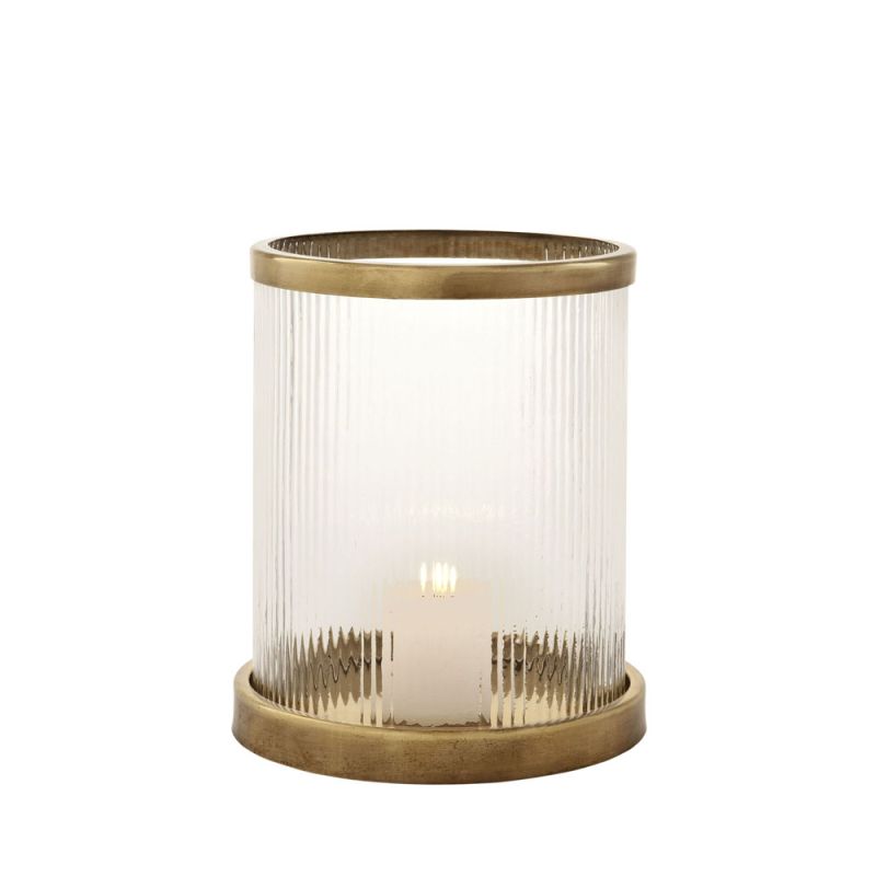 An elegant ribbed candle holder with an antique brass base and rim