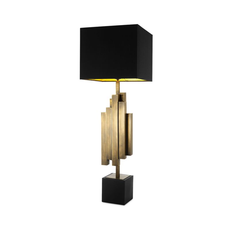 A stylish antique brass and black table lamp