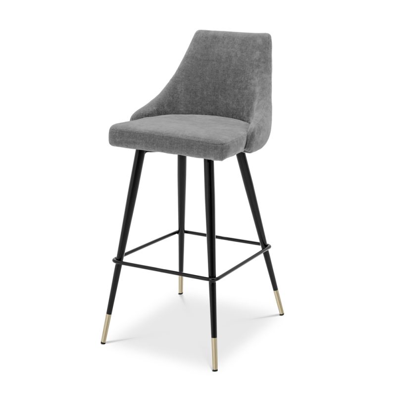 A modern grey velvet bar stool by Eichholtz 