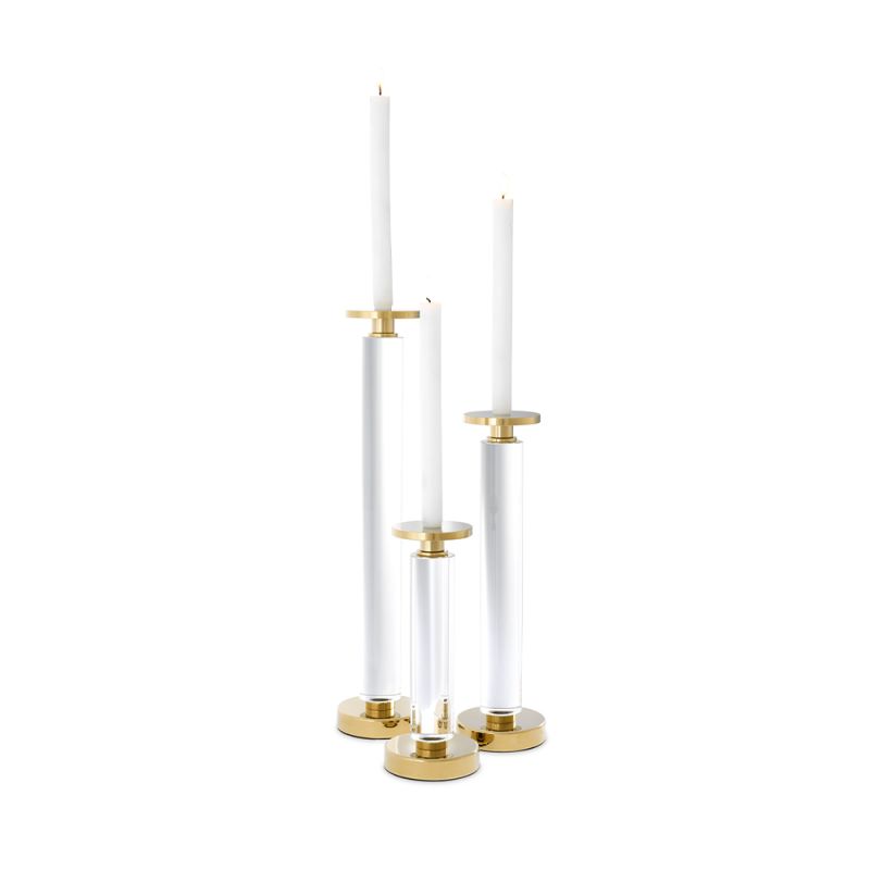 A luxury set of candle holders crafted from crystal glass with a gold finish