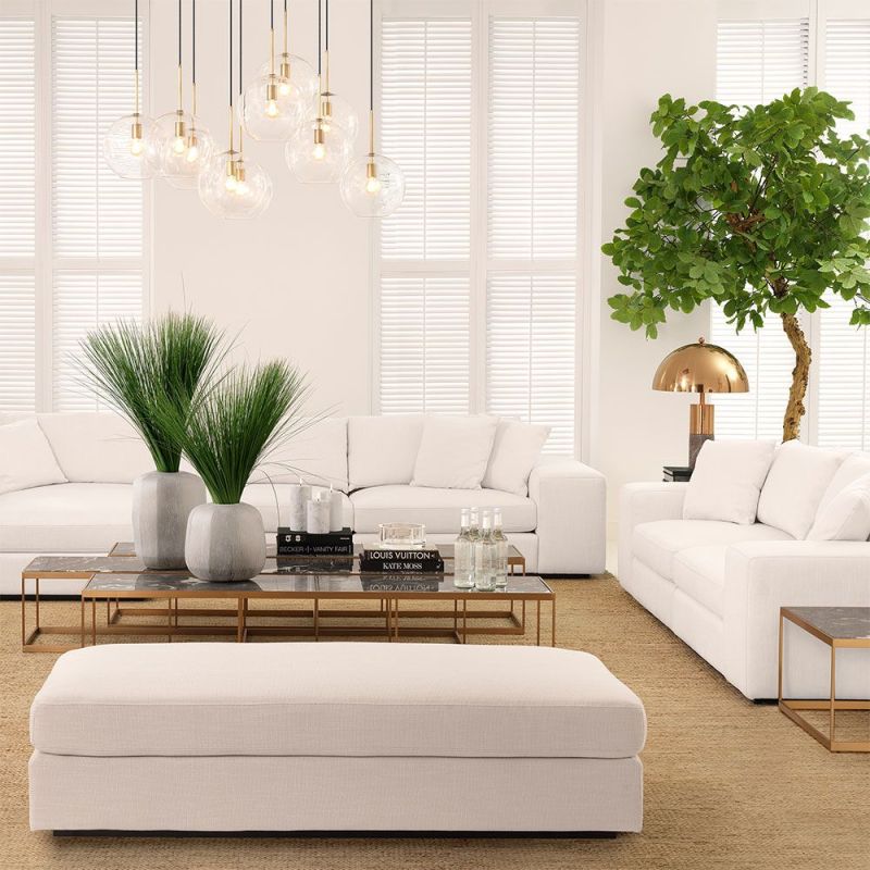 A classic white contemporary sofa with black base 