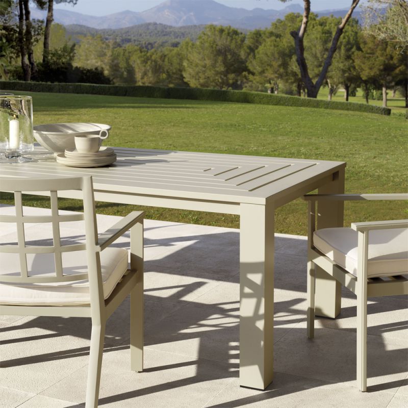 A stylish sand-coloured aluminium dining table