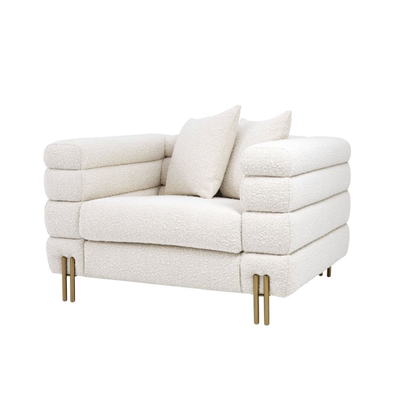 Luxurious modern armchair with brushed brass legs