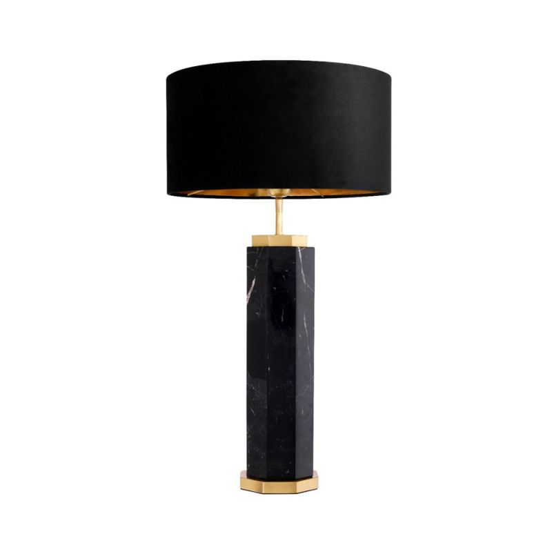 black marble table lamp with antique brass accents and a black lampshade