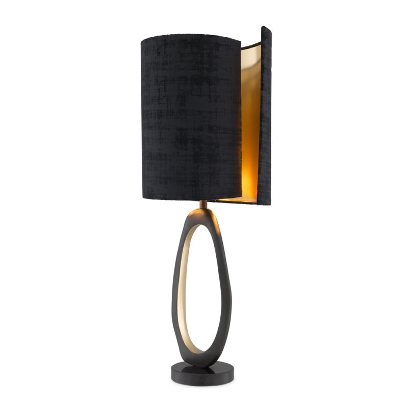 A modern luxury table lamp with black and brass accents by Eichholtz