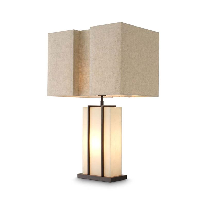 A contemporary table lamp with an alabaster base encased with a brass frame.