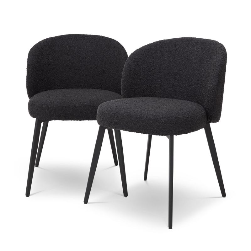 A set of two luxury dining chairs from Eichholtz with a beautiful boucle black upholstery