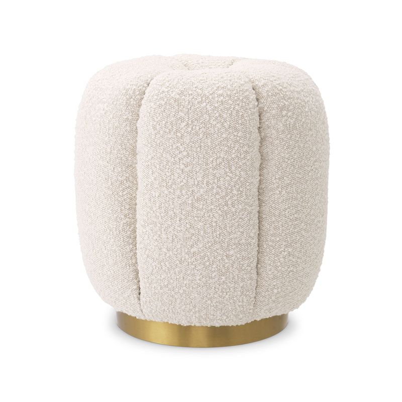 A stunning stool by Eichholtz with a boucle cream upholstery, deep channel stitching and a brushed brass base