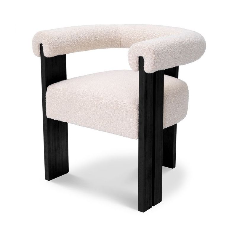Sleek boucle dining chair with round back and black wooden legs