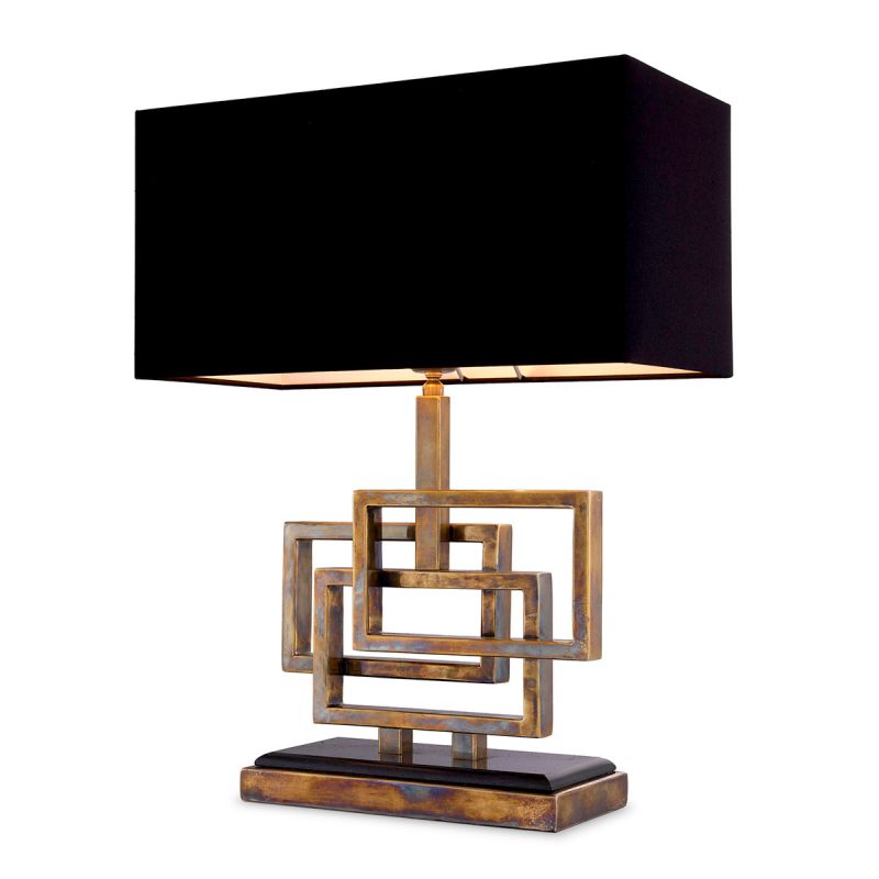 A luxury lamp by Eichholtz with a vintage brass finish
