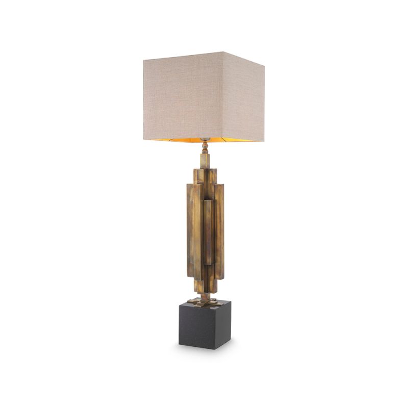 A stylish table lamp by Eichholtz with a structural design, stainless steel composition and vintage brass finish