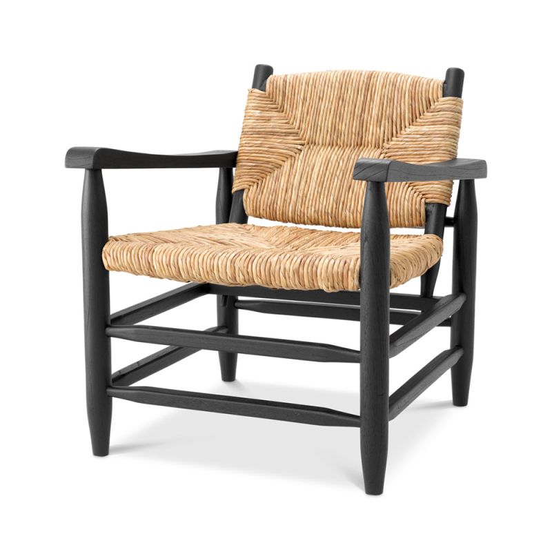 Bold black frame armchair with rustic woven backrest and seat