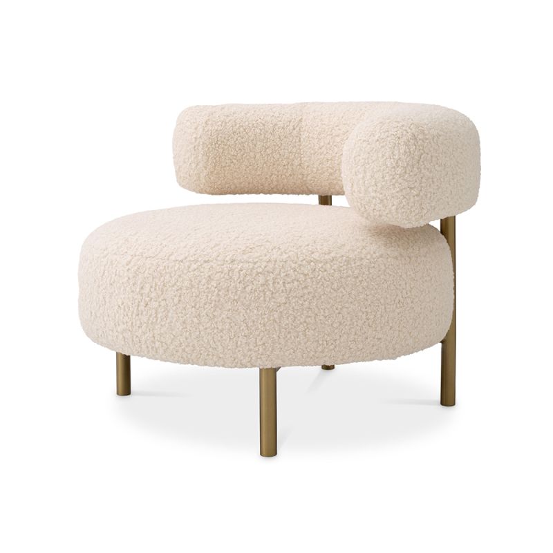 A glamorous chair by Eichholtz with a luxury upholstery and brushed brass legs 