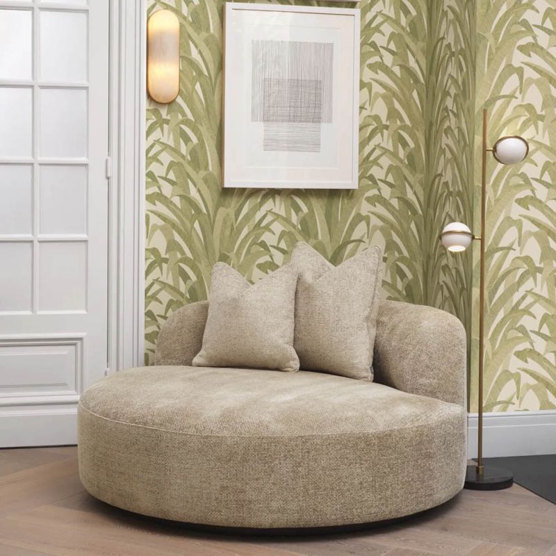 Sumptuous round sofa upholstered in soft Lyssa Sand fabric