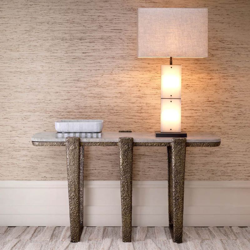 Sophisticated console table with vintage brass-finished framework and marble top