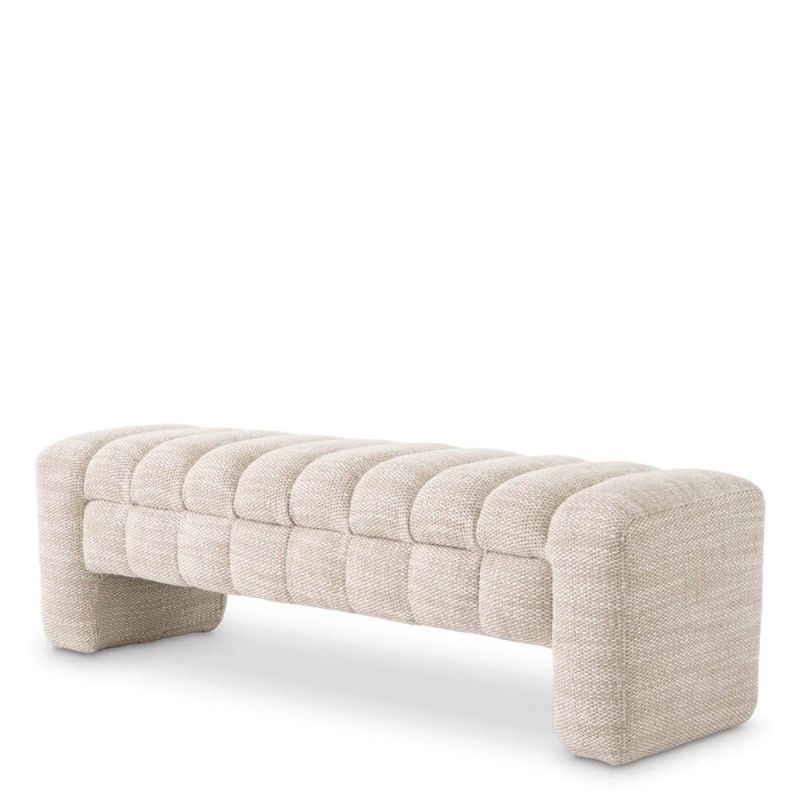 A contemporary bench by Eichholtz with a stunning sand coloured upholstery 