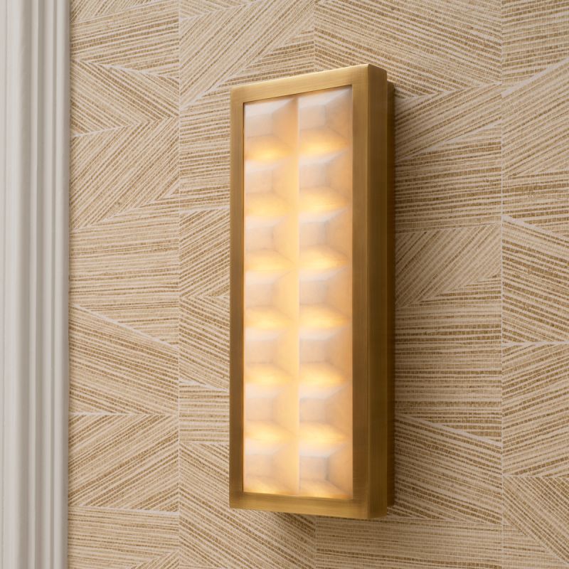 Softly quilted glass wall lamp with brass edge