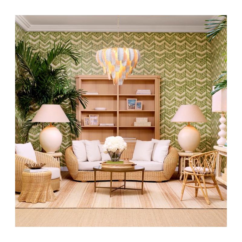 A statement side table with a rattan finish