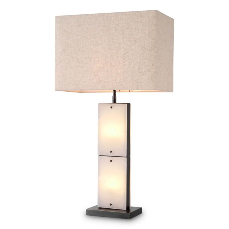 alabaster and bronze finish, with light warmly diffusing through the base for an inviting glow