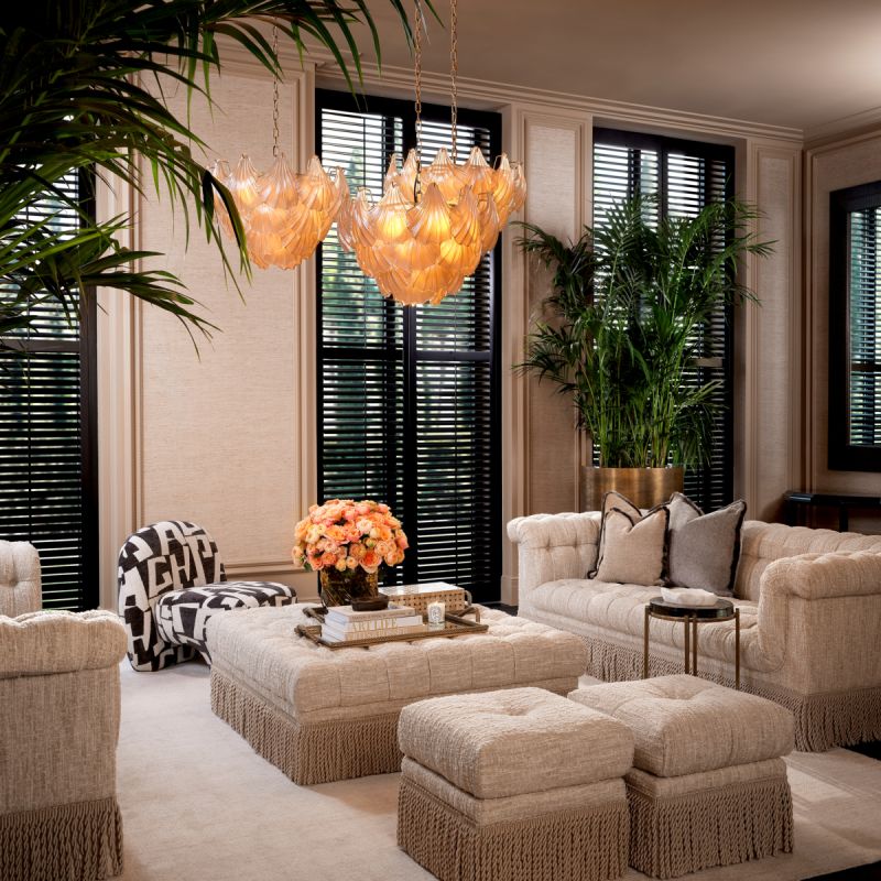 Classic opulent style sofa with a tasseled base