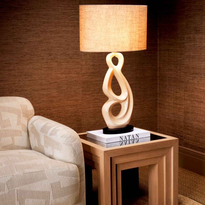 Elegant lamp with curved white ceramic frame
