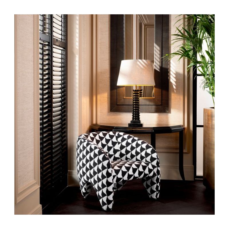 Striking chair featuring black and white geometric design