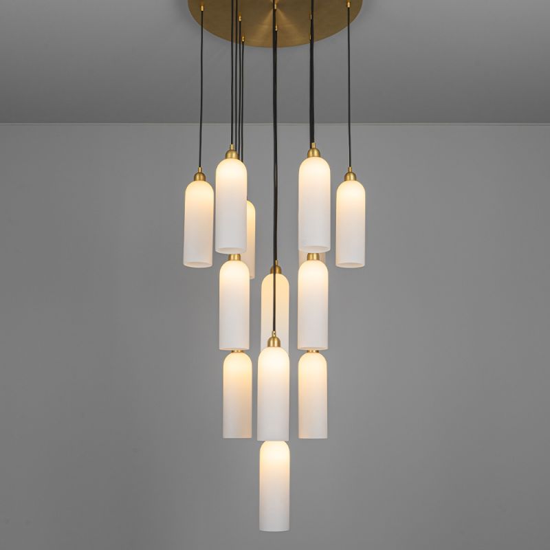 A luxurious chandelier by Schwung with translucent opal glass lampshades and a solid brass structure