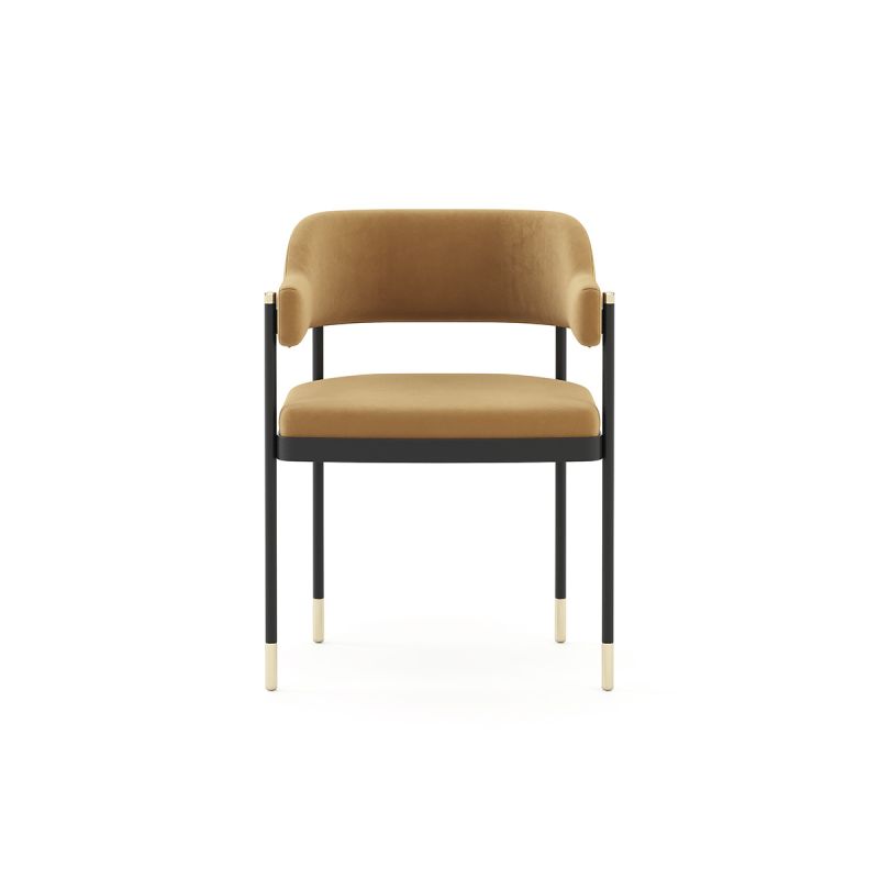 A luxurious dining chair with a minimal frame and velvet upholstery. Pictured in Vienna Camel.