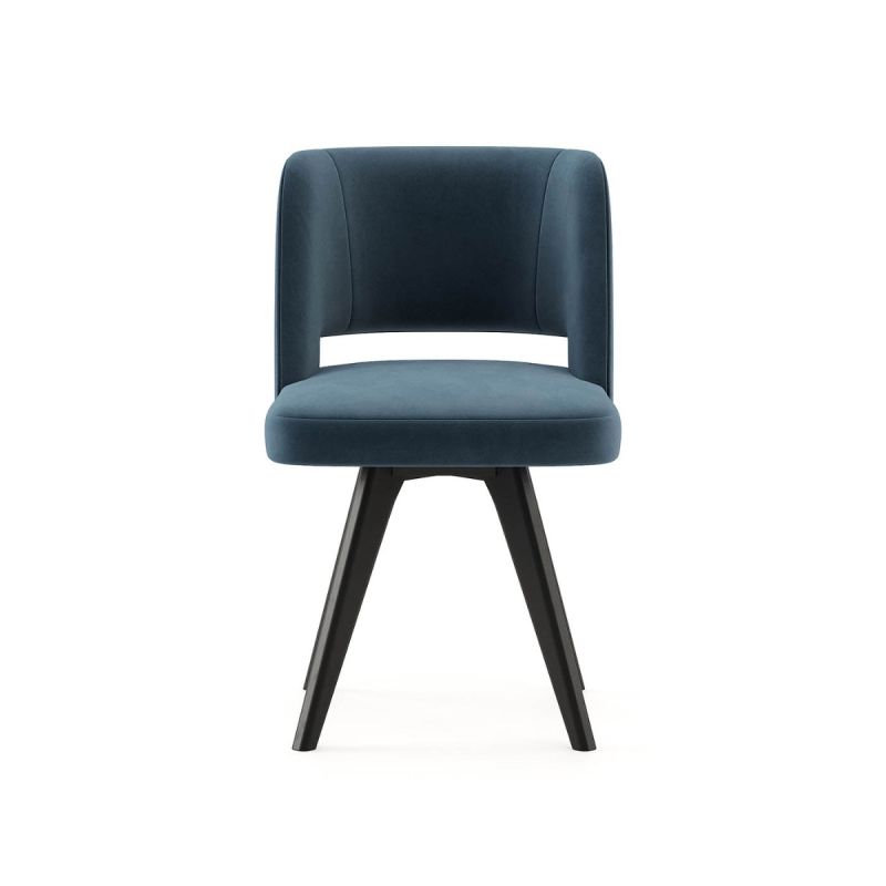 A glamorous Mid-Century dining chair with velvet upholstery and dark legs. Pictured in Vienna Ocean.