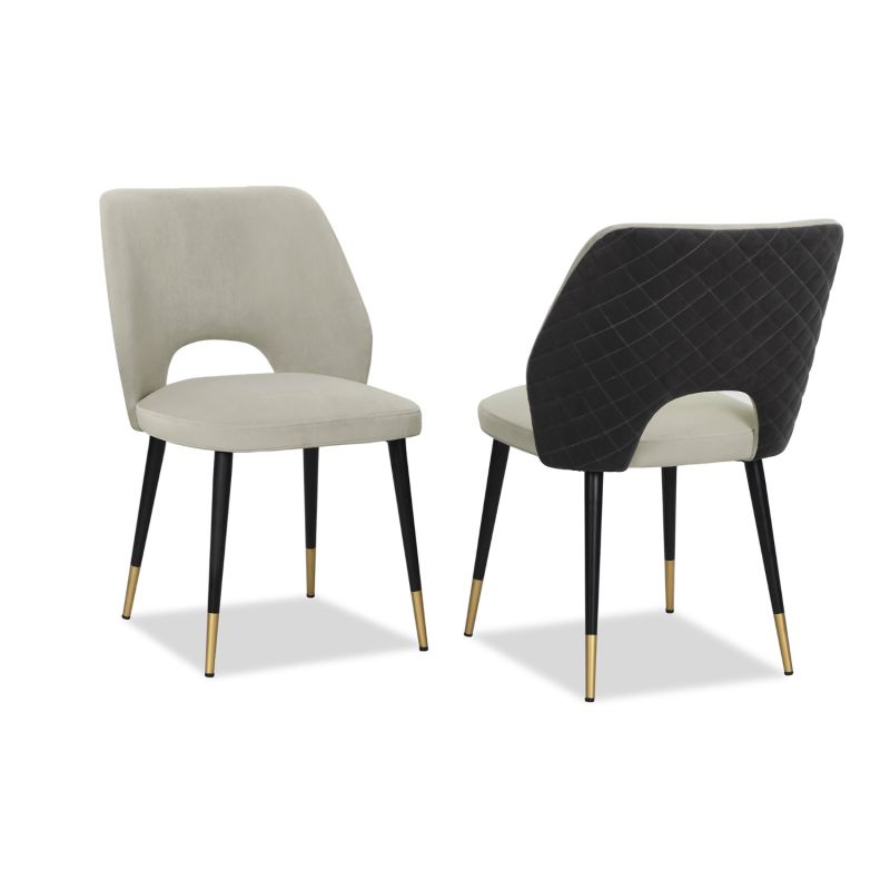 Elegant dining chairs with light grey velvet upholstery and quilted dark grey back