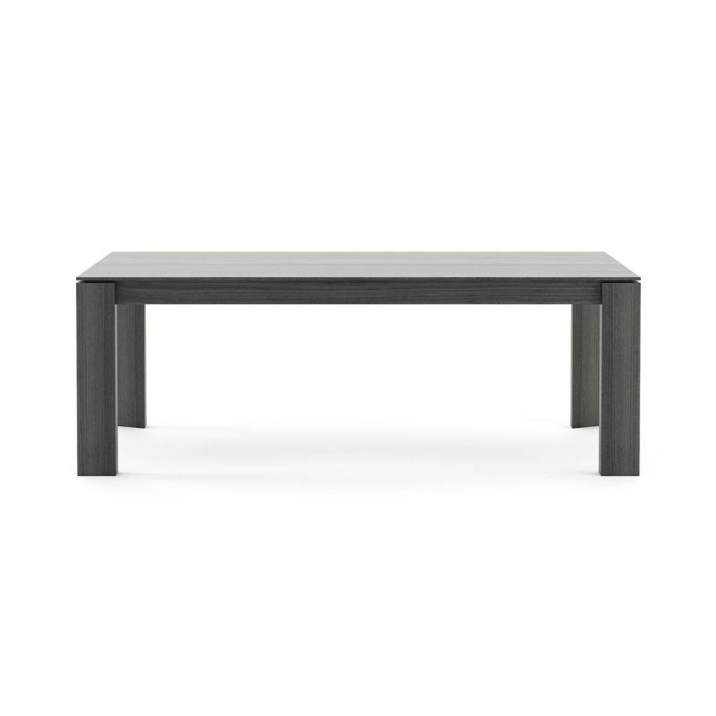 A luxurious, sculptural extendable dining table in a matte grey eucalyptus finish