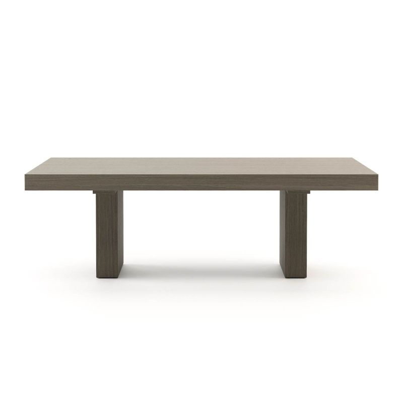 A luxurious minimal dining table in a grey eucalyptus finish