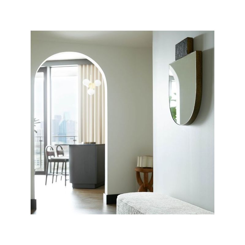 Upside down wall mirror with ribbed detail at the top
