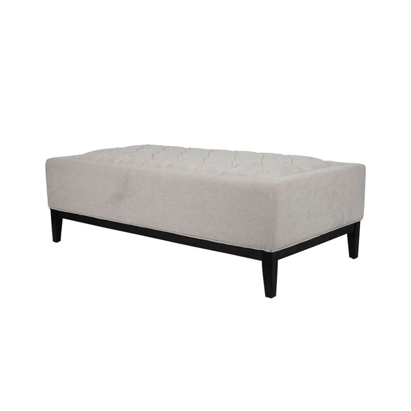 Simple ottoman with deep buttoning details on the seat