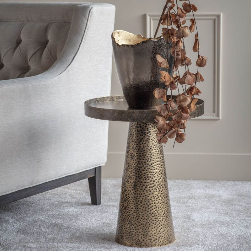 Opulent modern round side table with textured brass finish