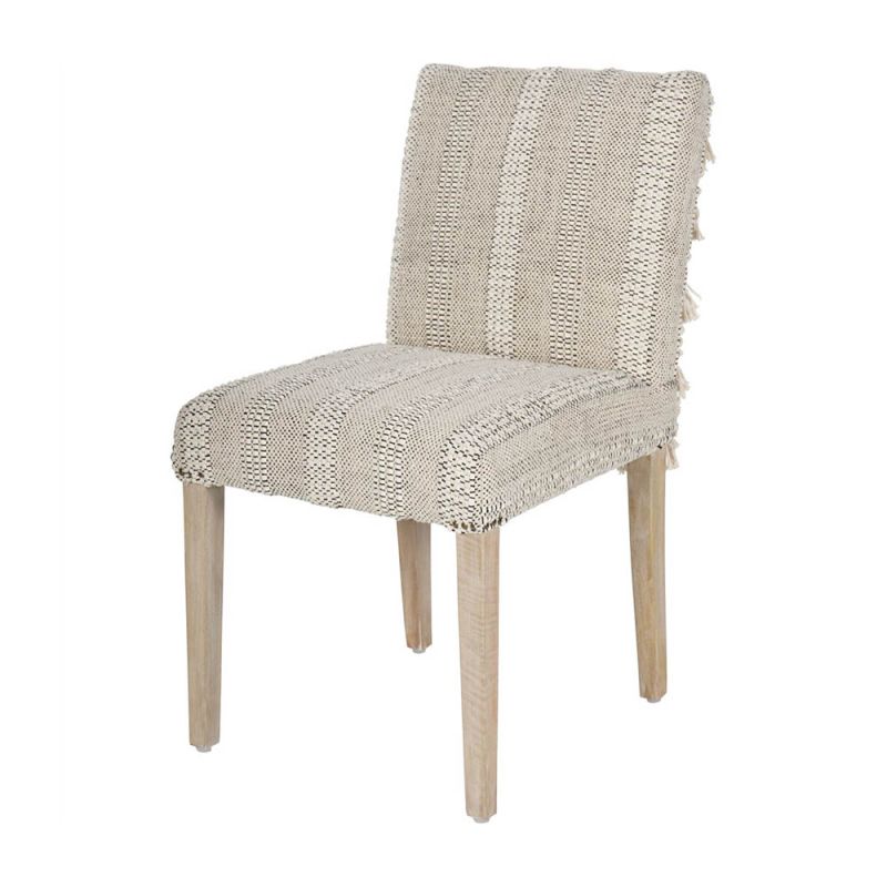 textured upholstered dining chair with tassel details and washed wood legs
