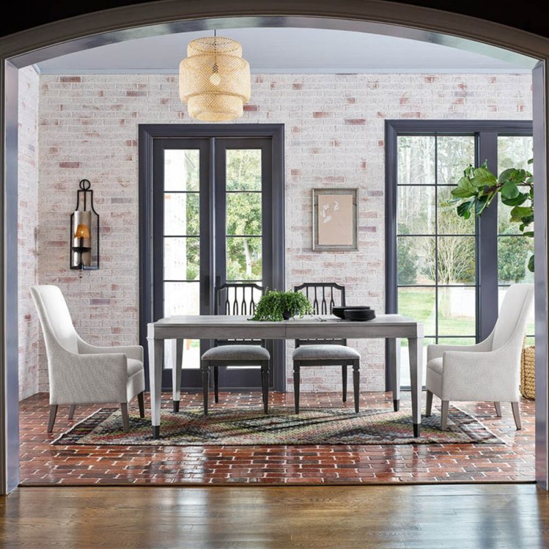 Wooden grey dining table with gracefully curved top