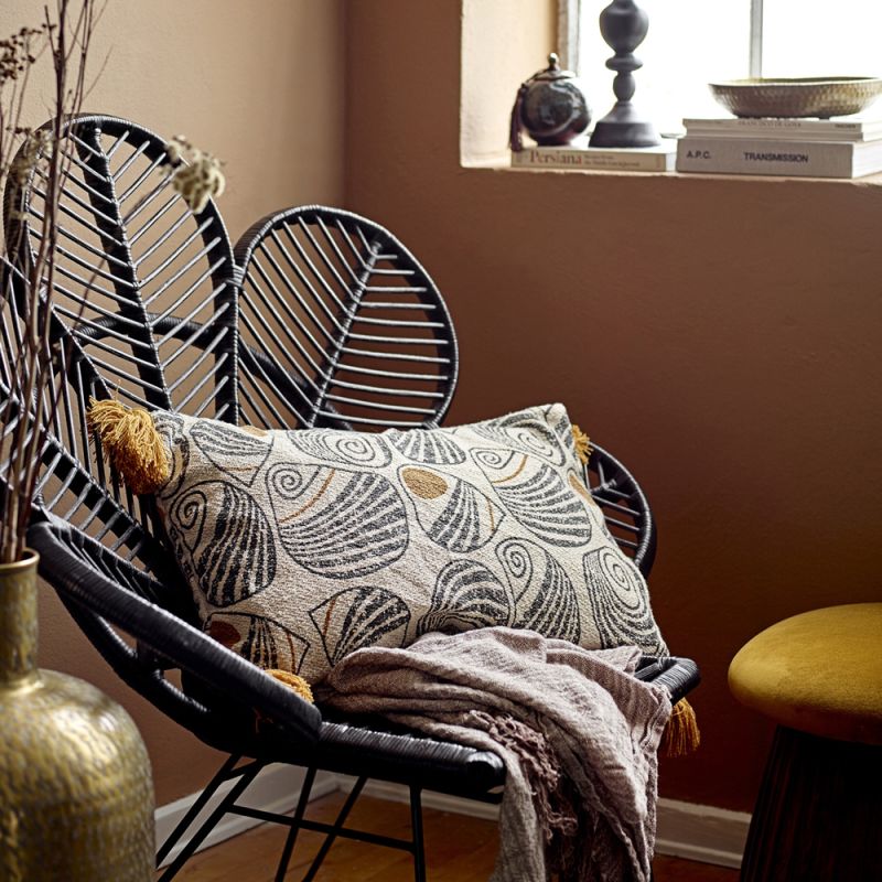 A gorgeous yellow and black patterned rectangular cushions with yellow fringing