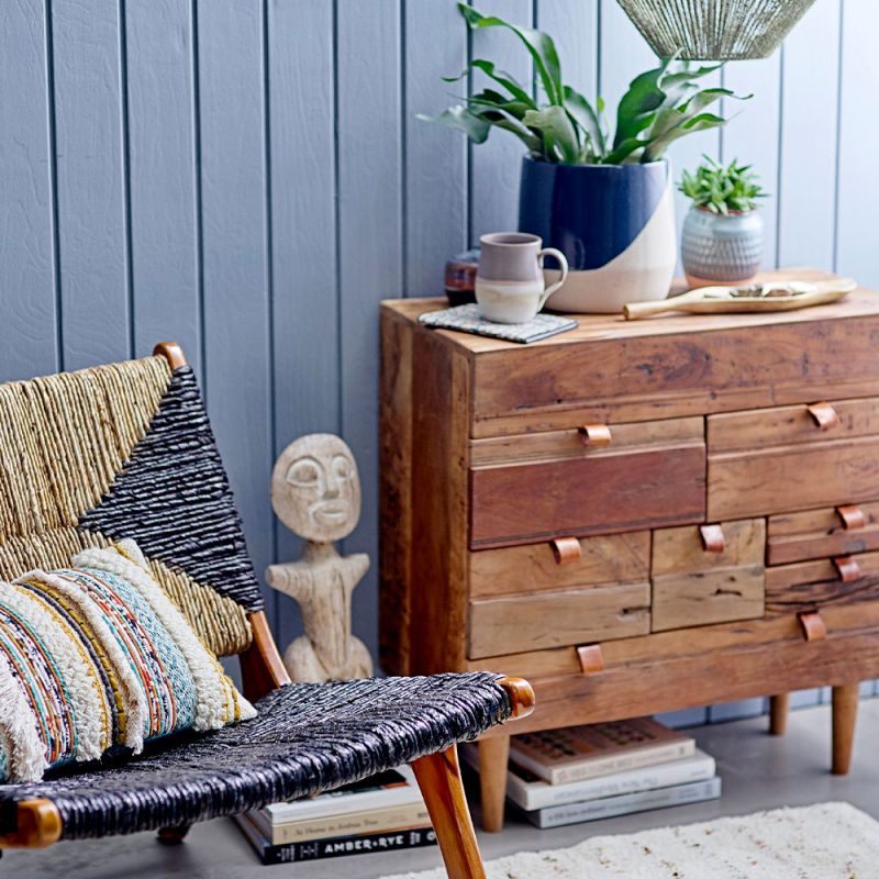 A graphic stoneware flowerpot with a matte and glazed textured finish