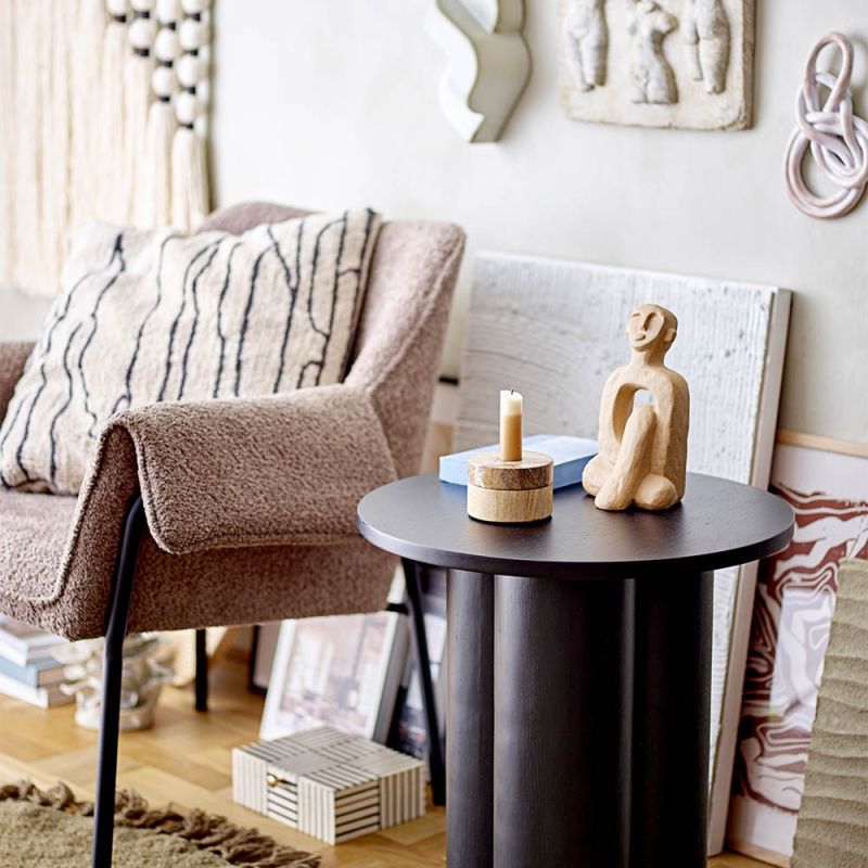 tall black coffee table with a stunning textured base