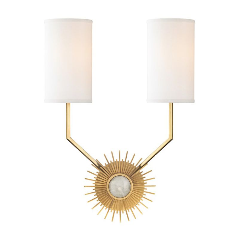 A glamorous sunburst wall sconce with dual silk lamps