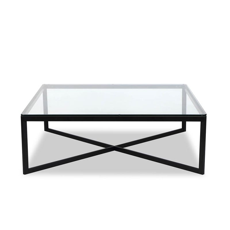 Black frame coffee table supporting clear glass top