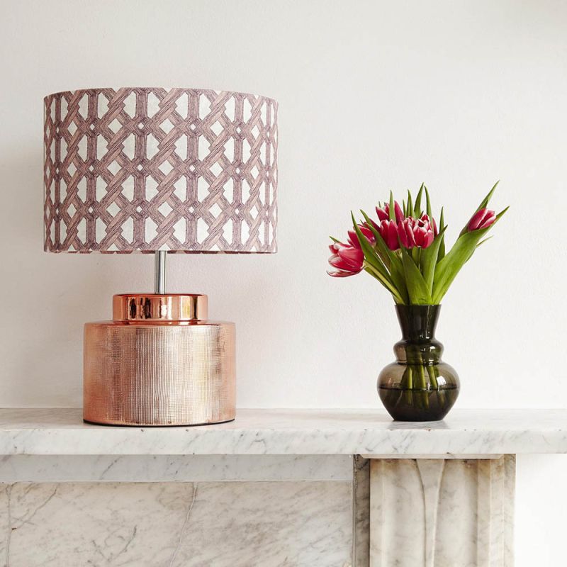 A luxury lampshade by Eva Sonaike with a pink African-inspired pattern