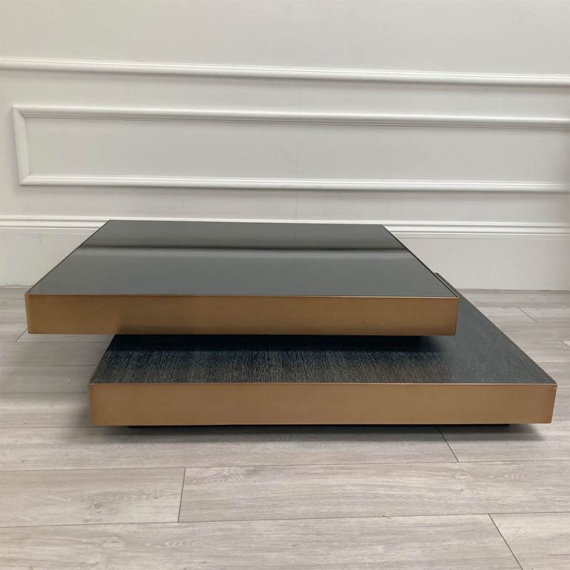 Lovely black and brass coffee tables with overlapping layers