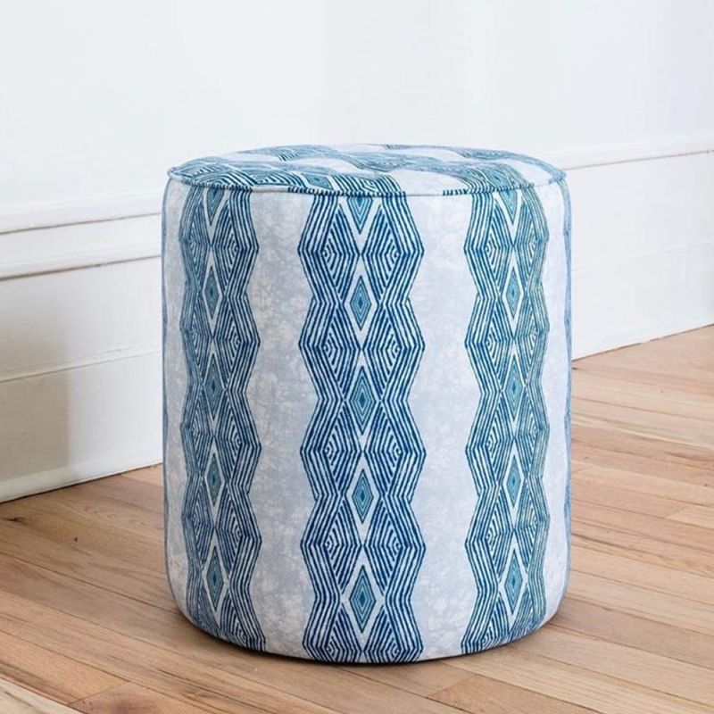 Elegant indigo patterned pouffe with quilted seat 