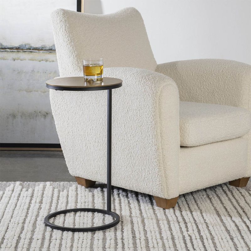 Metal side table with circular brass top